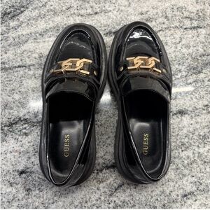 Guess Shiny Black Loafers with Gold Accent